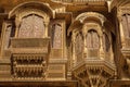 Rajasthan heritage building made of yellow limestone with intricate artwork known as the Patwon ki haveli at Jaisalmer. Royalty Free Stock Photo