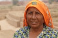 RAJASTHAN, INDIA - MARCH 16, 2018: Indian woman working on brick factory Royalty Free Stock Photo