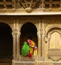 Rajasthani girls standing in window was taken at jaisalmer city