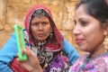 Rajasthani Kalbelia Woman with Teenage Tourist