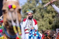 Rajasthani male on camel during bikaner camel festival