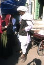 Rajasthani man in white turban and his veiled wife