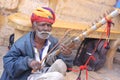 Rajasthani traditional folk artist playing ravanahatha violin at Jaisalmer fort