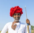 A Rajasthani tribal man wearing traditional colorful turban