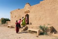 Rajasthani women visiting ruins, abandoned houses of Kuldhara village. It is said that this village is cursed and hence no human