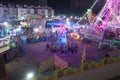 Rajkot, Gujarat, India, 06-09-2023, Incredible Neon Festival of Fun: A Captivating Blend of Rides and Excited Crowds
