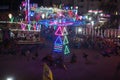 Rajkot, Gujarat, India, 06-09-2023, Neon Nightscape: Enchanting Lights and Ferris Wheel Crafting a Captivating Landscape