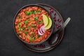 Rajma Masala Curry in black bowl on dark slate table top. Red Kidney Bean Dal is indian cuisine vegetarian dish Royalty Free Stock Photo