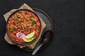 Rajma Masala Curry in black bowl on dark slate table top. Red Kidney Bean Dal is indian cuisine vegetarian dish Royalty Free Stock Photo