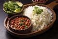 Rajma Masala Curry in black bowl on dark slate table top. Red Kidney Bean Dal is indian cuisine vegetarian dish. Asian food, meal Royalty Free Stock Photo