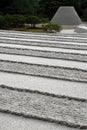 Raked sand lines and cone