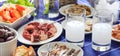 Raki glasses and seafood appetizers background, closeup view Royalty Free Stock Photo