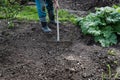 Raking the garden - senior hobby. Moody colors