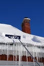 Raking Snow off a Roof