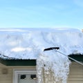 Raking snow from roof