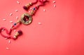 Raksha Bandhan, Indian festival with beautiful Rakhi and Rice Grains on red background. A traditional Indian wrist band which is