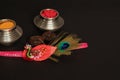 Raksha bandhan raakhi or rakhi with Kumkum on black background