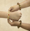 raksha Bandhan A sister is binding rakhi on her brother s hand on the occasion of raksha Bandhan Royalty Free Stock Photo