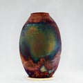 RAAQUU raku fired pottery globe vase Royalty Free Stock Photo