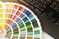 Ral color fan cmyk on black keyboard Royalty Free Stock Photo