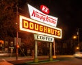 Raleigh, NC / United States - Oct. 12, 2019: Landcape three-quarter image of the iconic neon Krispy Kreme Sign at night