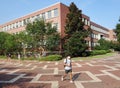 RALEIGH,NC/USA - 8-10-2020: A student wearing a mask walks on campus at NC State University in Raleigh, NC after returning to