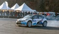 Rally car during race with crowd watching Royalty Free Stock Photo