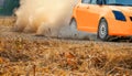 Rally racing car on dirt road