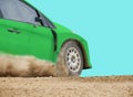 Rally racing car on dirt road, with clipping path