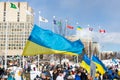 Rally in support of Ukraine against war. Protest and march against Russian invasion. Ukrainian flags in Canada