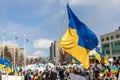 Rally in support of Ukraine against war. Protest and march against Russian invasion. Ukranian flags