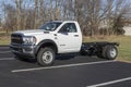 Ram 5500 Heavy Duty Chassis Cab on display at a Stellantis Ram dealership. The Ram 5500 is available as a Tradesman or XLT model