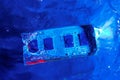 RAM memory from a laptop, ram. Blue and red light, under water. Technology of cyber-electronic concept. Technological background