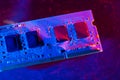 RAM memory from a laptop, ram. Blue and red light, under water. Technology of cyber-electronic concept. Technological background