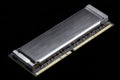RAM memory module with gold contacts isolated on dark background. Royalty Free Stock Photo