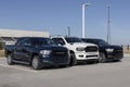 Ram 2500 and 1500 pickup truck display at a dealership. Stellantis offers the 2500 and 1500 with gas or diesel engines