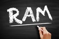 RAM Random Access Memory - form of computer memory that can be read and changed in any order, acronym text on blackboard Royalty Free Stock Photo