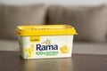 Rama Classic 100 Natural butter margarine in typical yellow box in kitchen Royalty Free Stock Photo