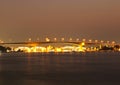 Rama III bridge across Chao Phraya river at night.