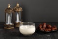 Ramadan Concept. Dates Milk Susu Kurma with Date Fruit in the Background. Ramadan Lantern on Wooden Table Royalty Free Stock Photo