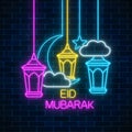 Ramadan greeting card with fanus lanterns, star and crescent. Eid mubarak greetings Glowing neon ramadan holy month sign Royalty Free Stock Photo