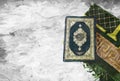 Ramadan greeting cards with Koran background and prayer rugs