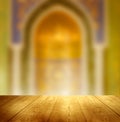 Mosque window with lantern lightning and wooden table Royalty Free Stock Photo