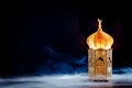 Ramadan Kareem background with ornamental wooden lantern glowing at night. Muslim Holy Month Ramadan Kareem banner design