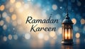 Ramadan Kareem golden light background with lantern and Ramadan Kareem greetings write. Royalty Free Stock Photo