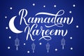 Ramadan Kareem calligraphy lettering with lanterns on night sky background. Muslim holy month typography poster. Vector Royalty Free Stock Photo