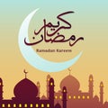 Ramadan Kareem Classic Arabic Calligraphy with Crescent moon and mosque silhouette background