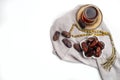 Ramadan Kareem Festive, close up of dates on bowl and cup of black tea on white isolated background Royalty Free Stock Photo