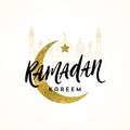 Ramadan Kareem greeting card - Brush calligraphy greeting against a glitter gold moon, star and silhouette of mosque. Royalty Free Stock Photo