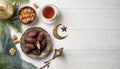 Ramadan Kareem greeting card design. Dried dates in Islamic star and crescent moon plate, nuts, oriental lantern, cup of tea on